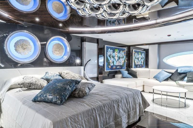 a room with a bed and a couch aboard MY FALCON Yacht for Sale