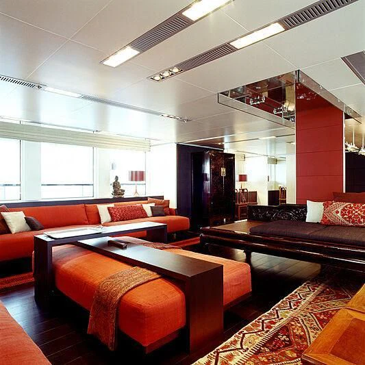a room with couches and a table aboard MY FALCON Yacht for Sale