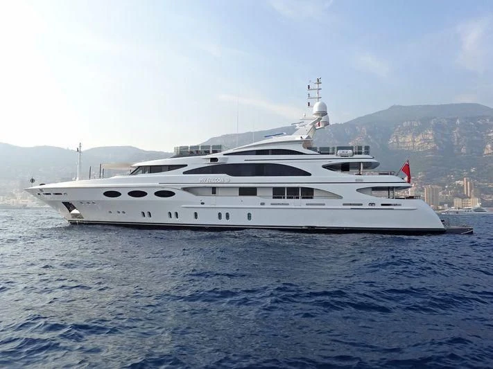 a white yacht in the water aboard MY FALCON Yacht for Sale
