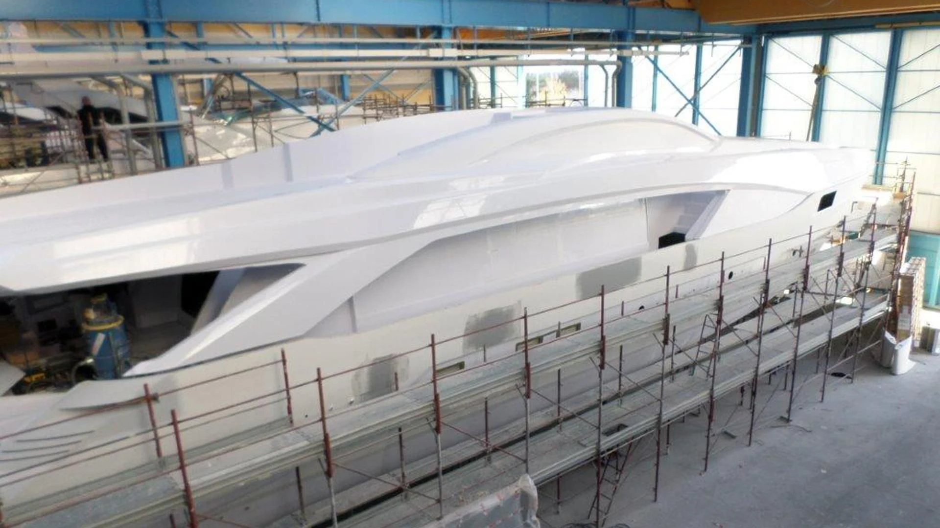 a large white factory aboard MELT Yacht for Sale
