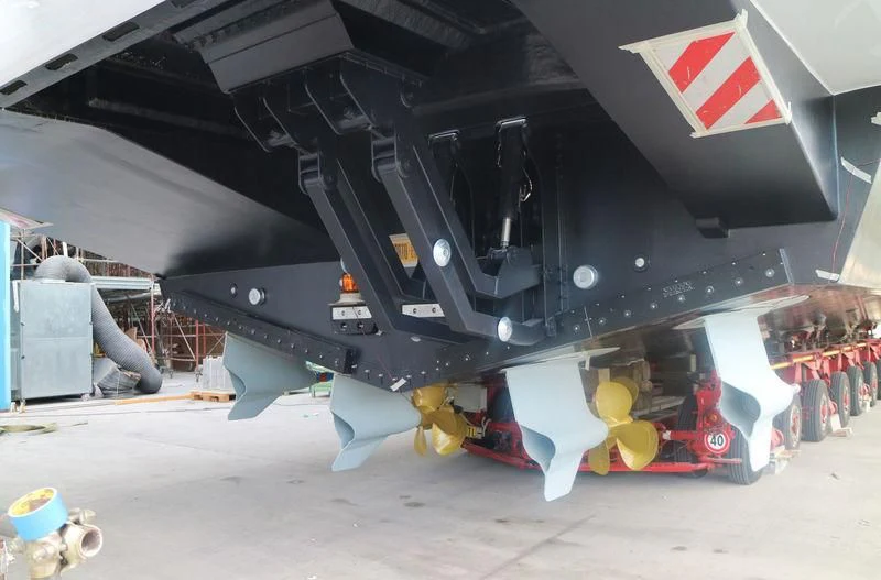 a large machine with a flag on it aboard MELT Yacht for Sale