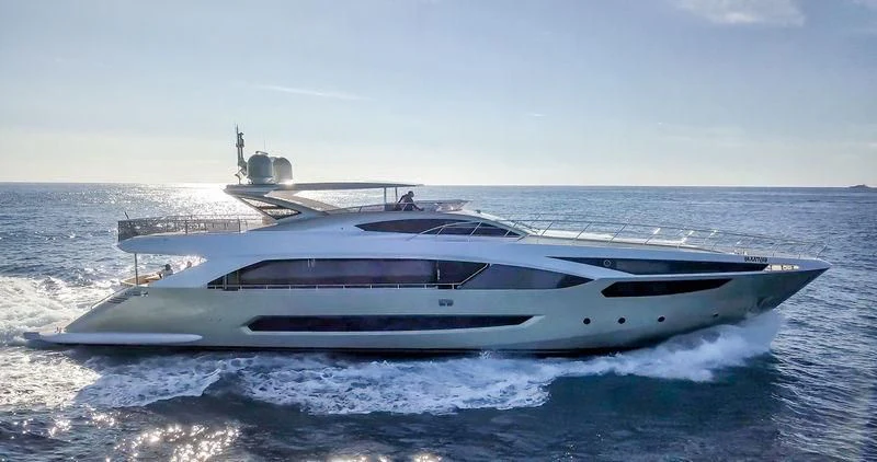a white yacht on the water aboard MELT Yacht for Sale