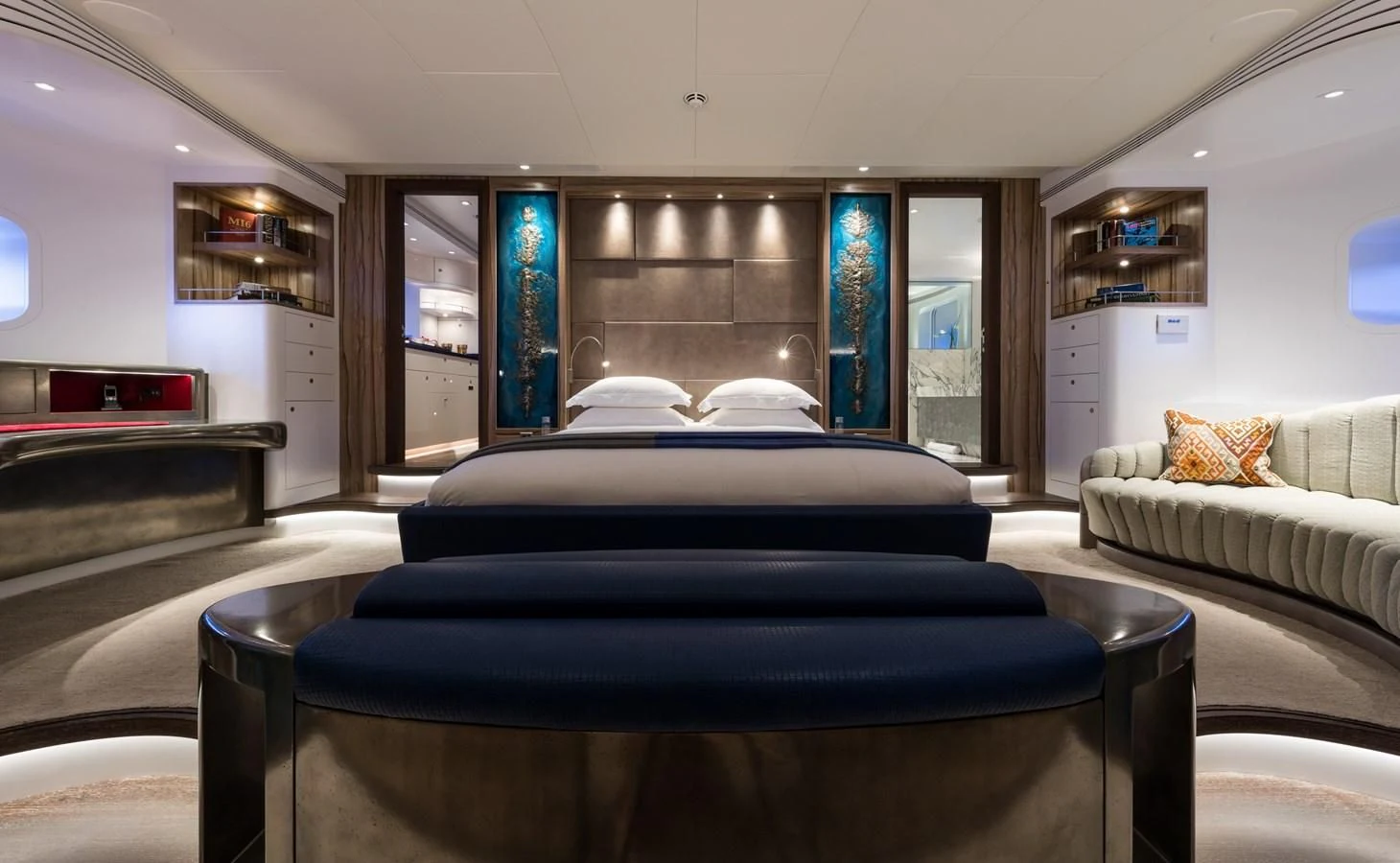 a living room with a couch and a tv aboard NGONI Yacht for Sale