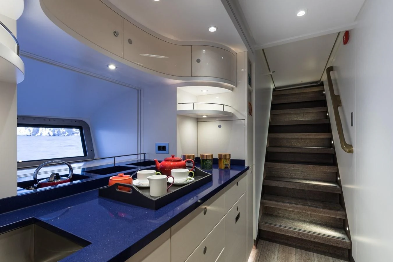 a kitchen with a large window aboard NGONI Yacht for Sale