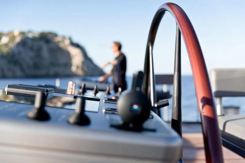 a person sitting on a boat aboard NGONI Yacht for Sale
