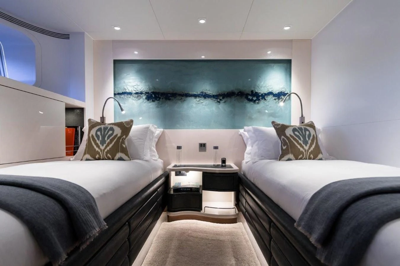 a room with two beds aboard NGONI Yacht for Sale