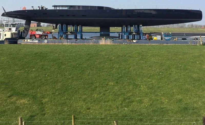 a large truck parked in a large field aboard NGONI Yacht for Sale