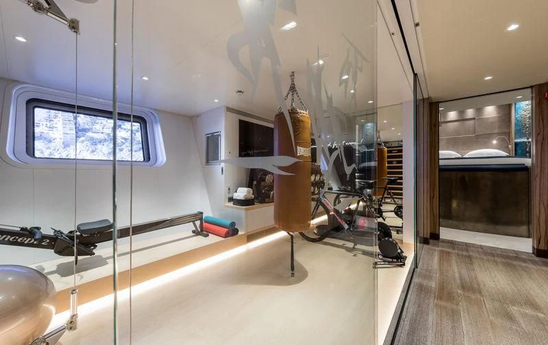 a room with a large mirror and a large window aboard NGONI Yacht for Sale