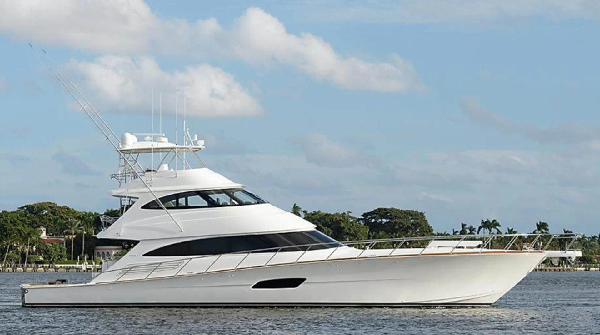 a white yacht on the water aboard SWEETUMS Yacht for Sale