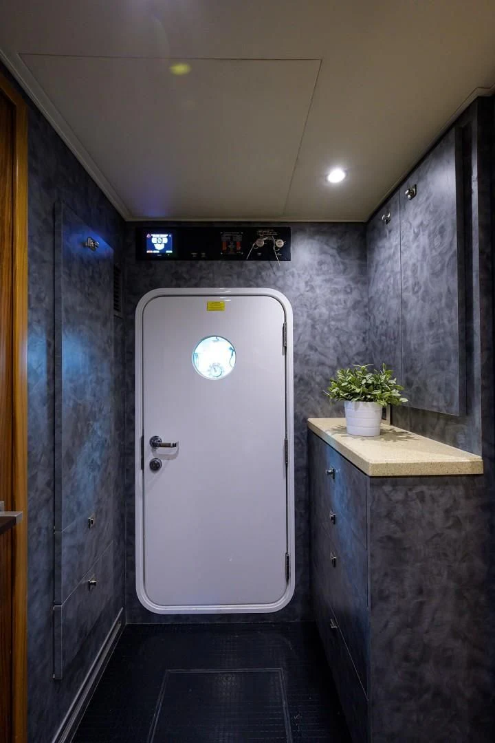 a white door in a room aboard SWEETUMS Yacht for Sale