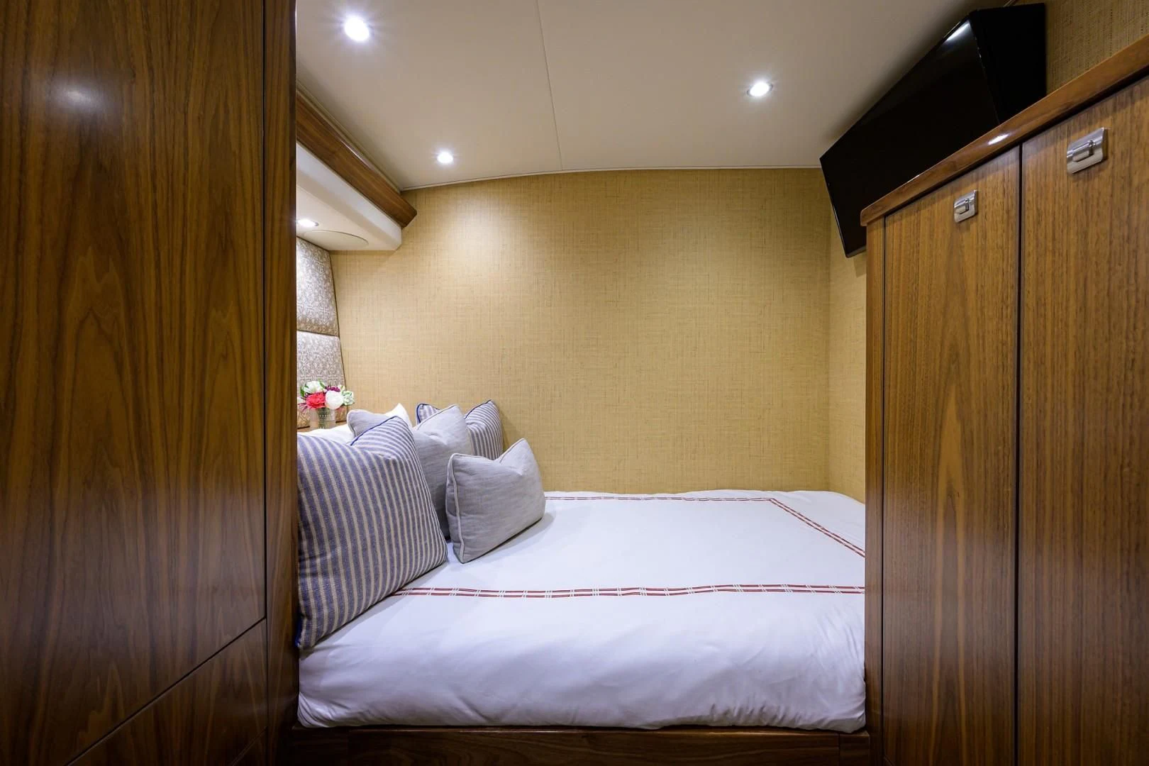 a bed with a pink sheet aboard SWEETUMS Yacht for Sale