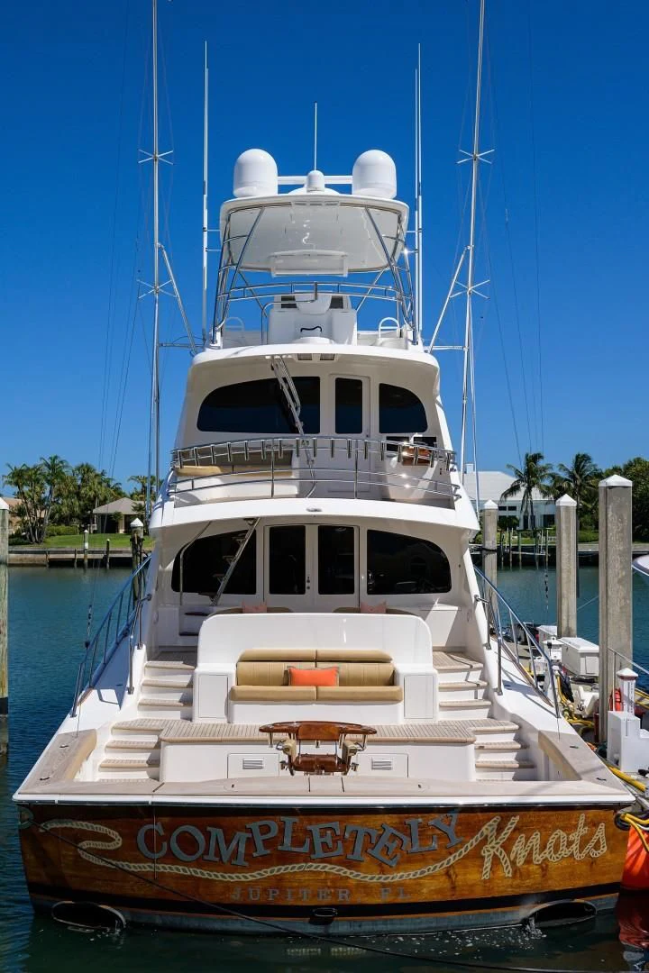 a boat docked at a pier aboard SWEETUMS Yacht for Sale