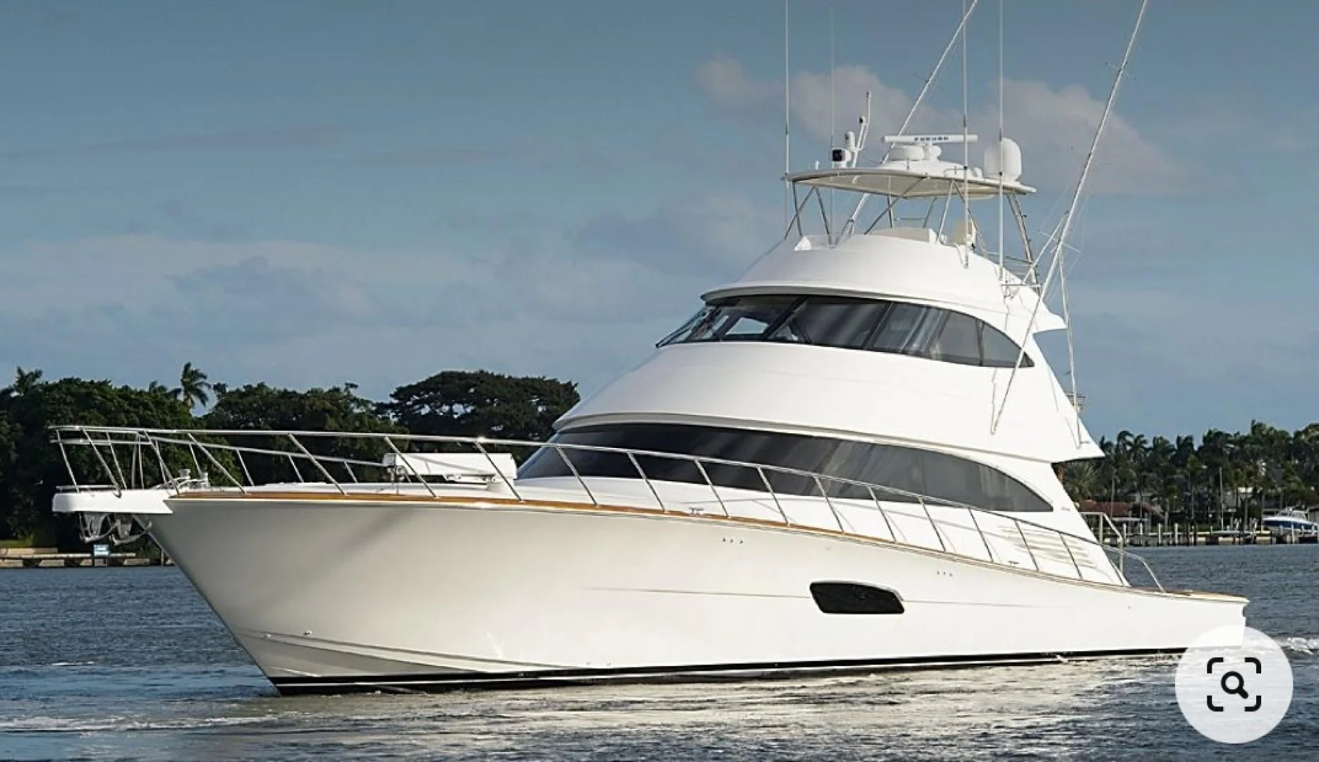 a white yacht on the water aboard SWEETUMS Yacht for Sale