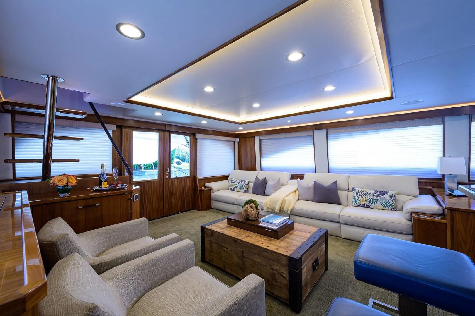 a living room with a large window aboard SWEETUMS Yacht for Sale