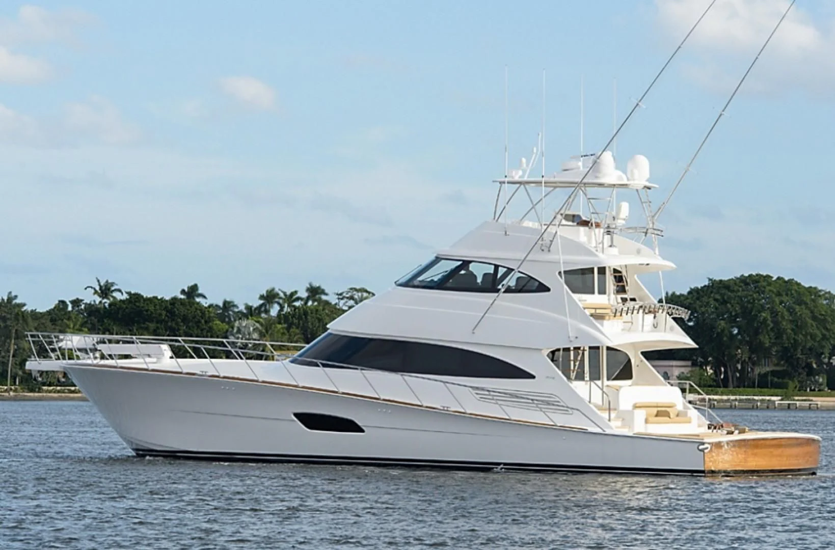 a white yacht on the water aboard SWEETUMS Yacht for Sale