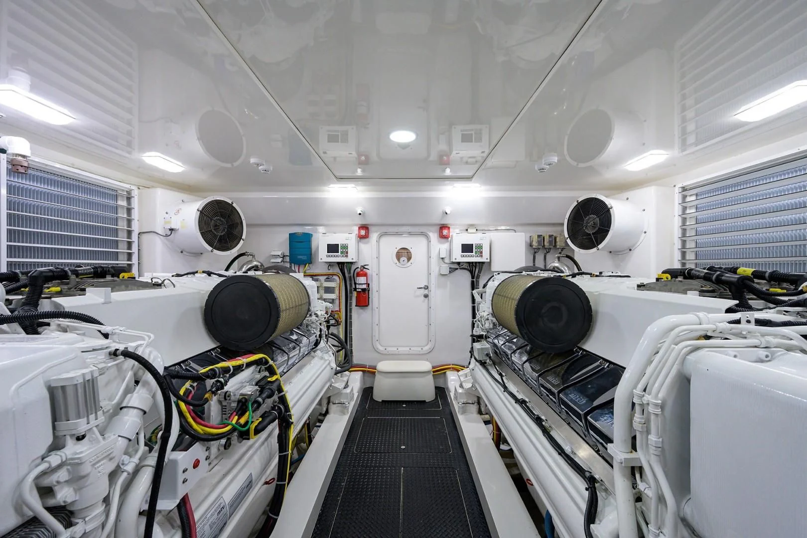 a room with white machines aboard SWEETUMS Yacht for Sale