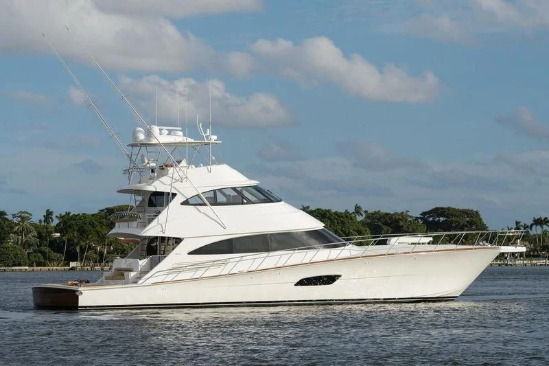 a white yacht on the water aboard SWEETUMS Yacht for Sale