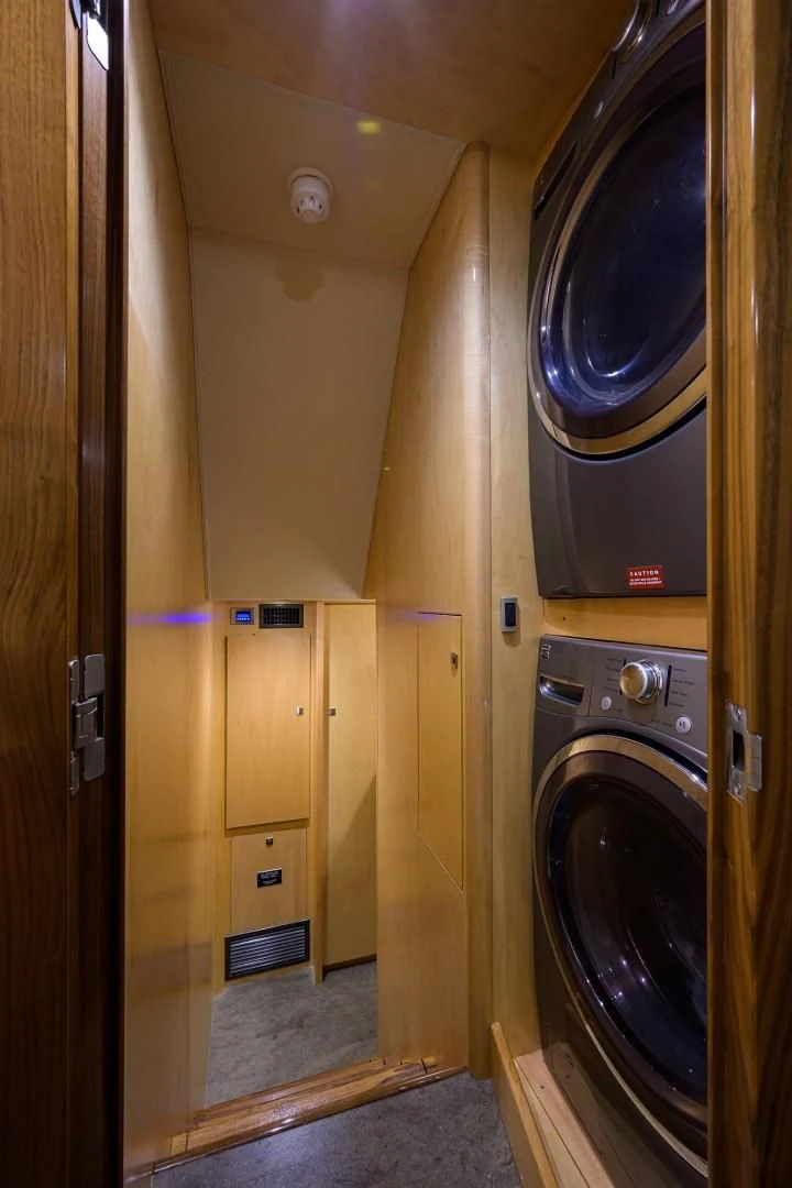 a room with a washer and dryer aboard SWEETUMS Yacht for Sale