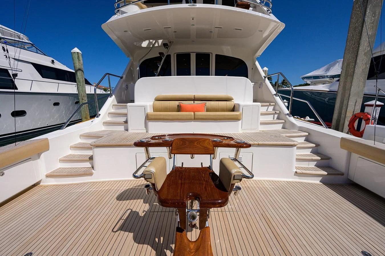 a boat with a steering wheel aboard SWEETUMS Yacht for Sale