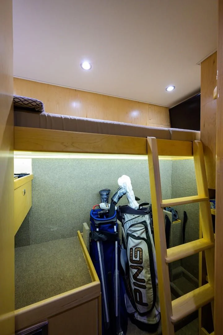 a rack with a rack of skis and a bottle on it aboard SWEETUMS Yacht for Sale