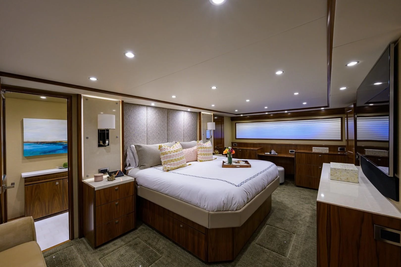 a room with a bed and a desk aboard SWEETUMS Yacht for Sale