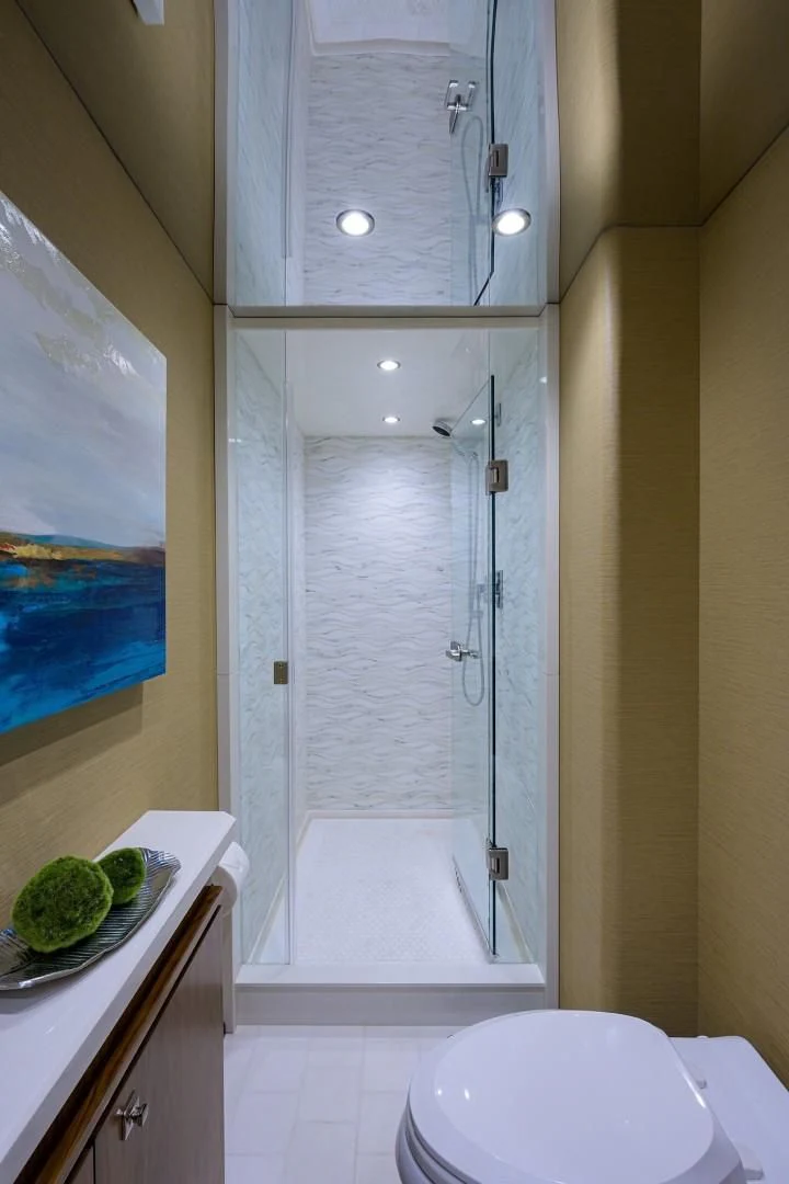 a bathroom with a shower unit aboard SWEETUMS Yacht for Sale