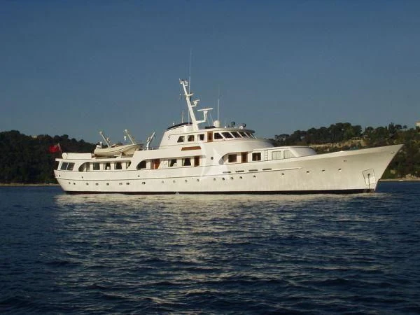 a white boat in the water aboard SECRET LIFE Yacht for Sale