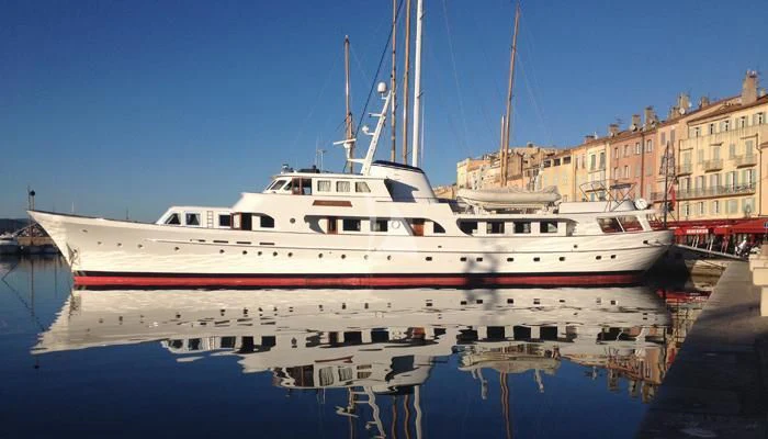 a boat docked at a pier aboard SECRET LIFE Yacht for Sale