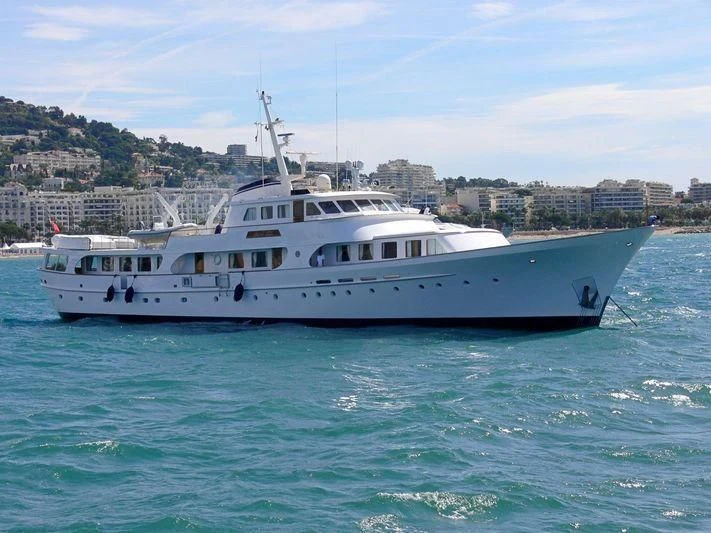 a white boat in the water aboard SECRET LIFE Yacht for Sale
