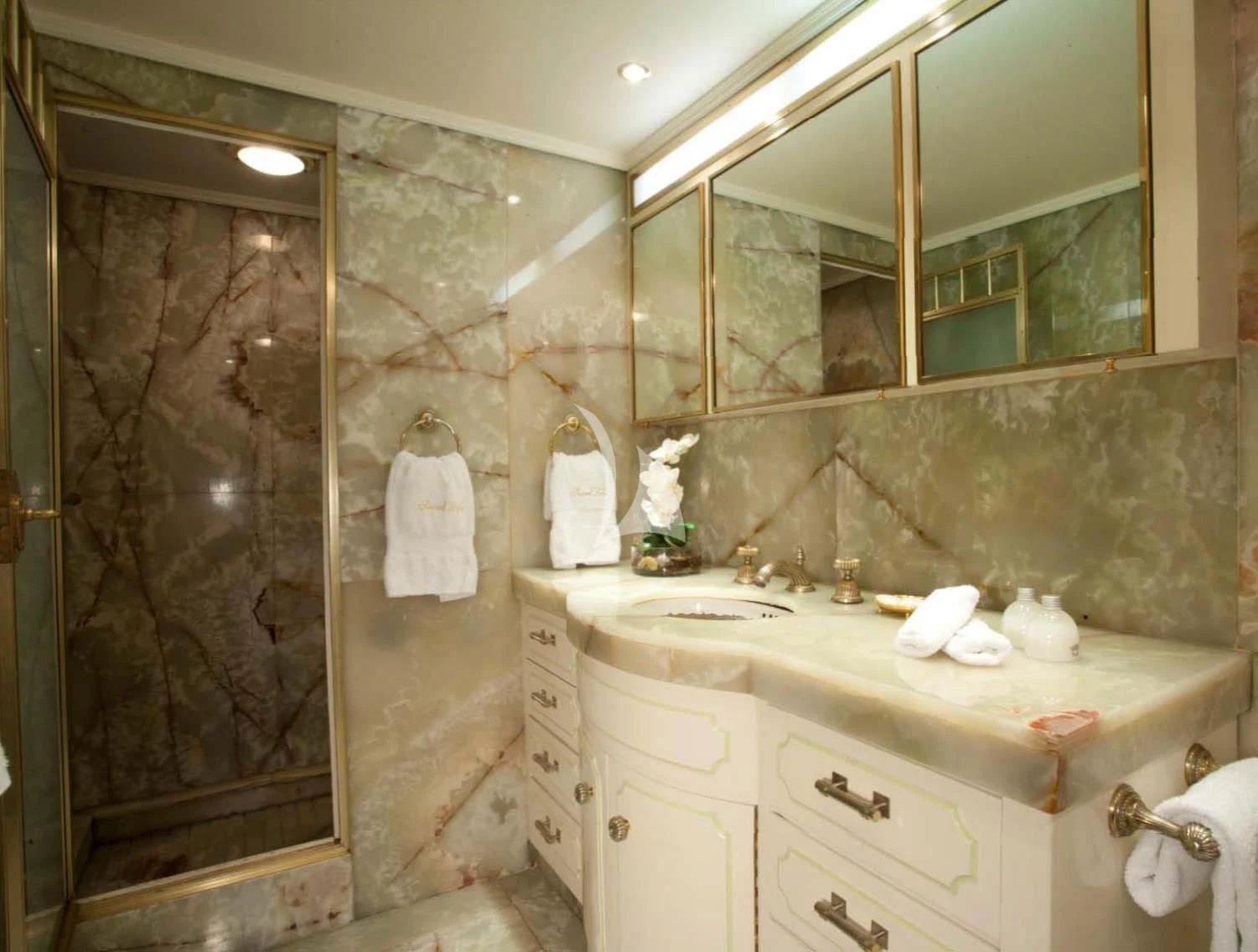 a bathroom with a glass shower aboard SECRET LIFE Yacht for Sale