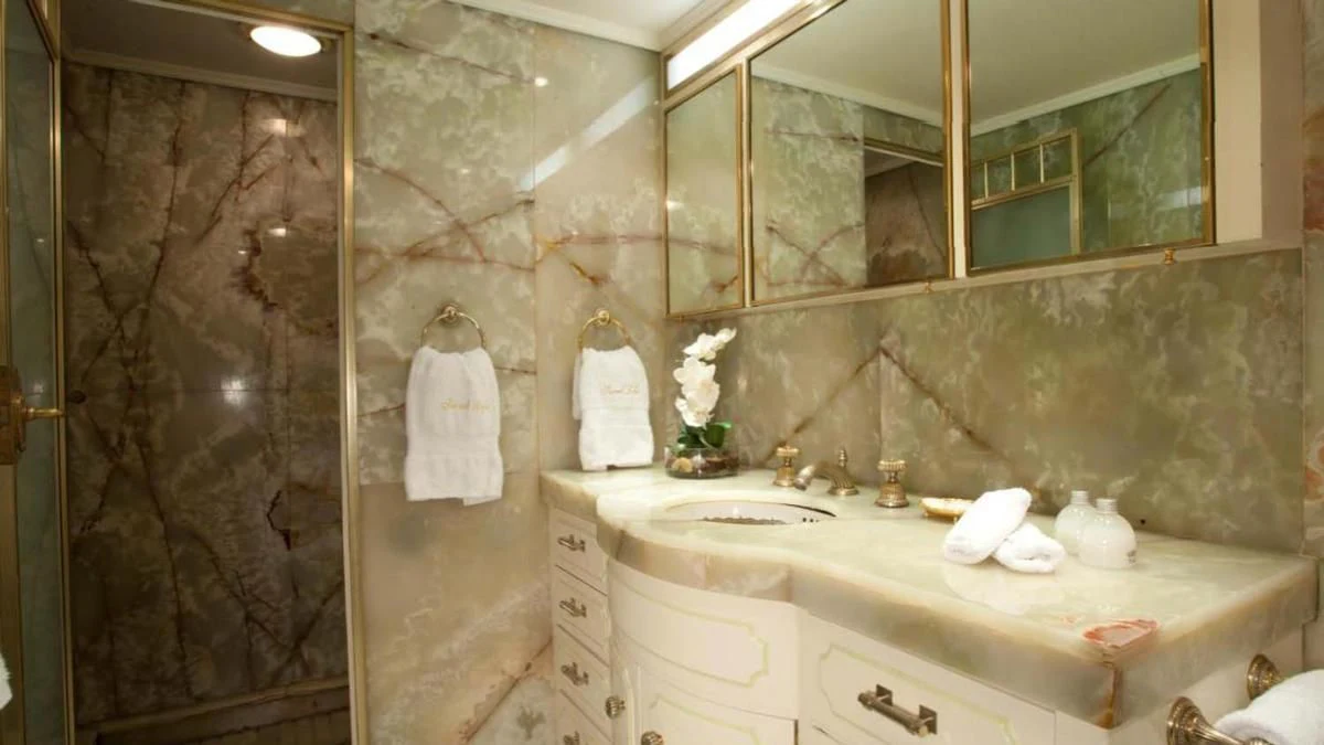 a bathroom with a large mirror aboard SECRET LIFE Yacht for Sale