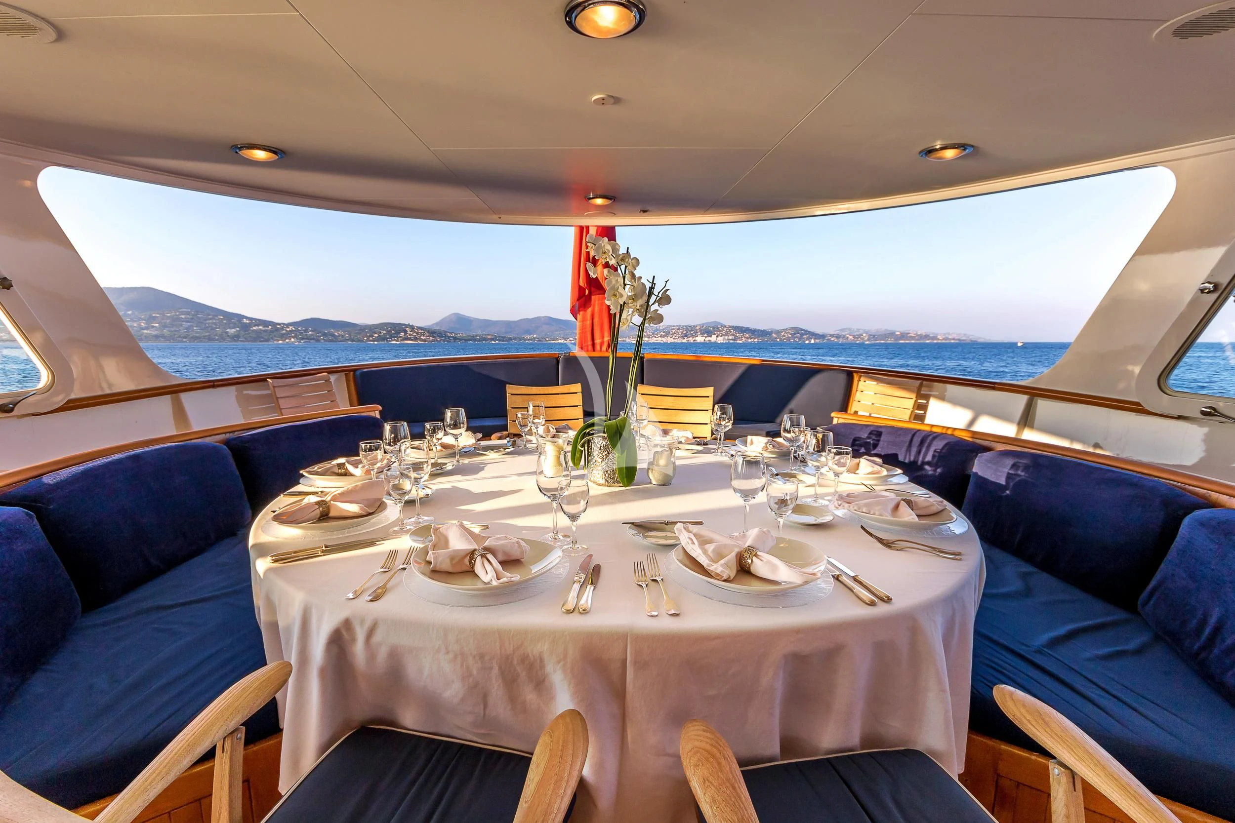 a table set for a dinner aboard SECRET LIFE Yacht for Sale