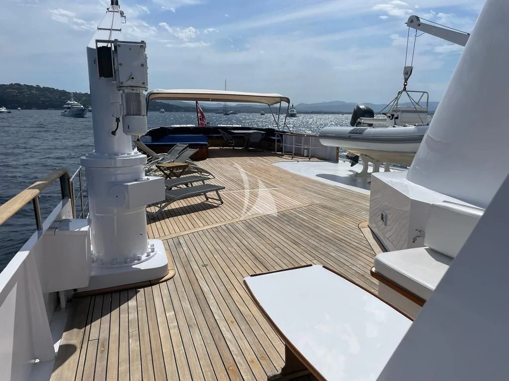 a deck with a deck and a boat on it aboard SECRET LIFE Yacht for Sale