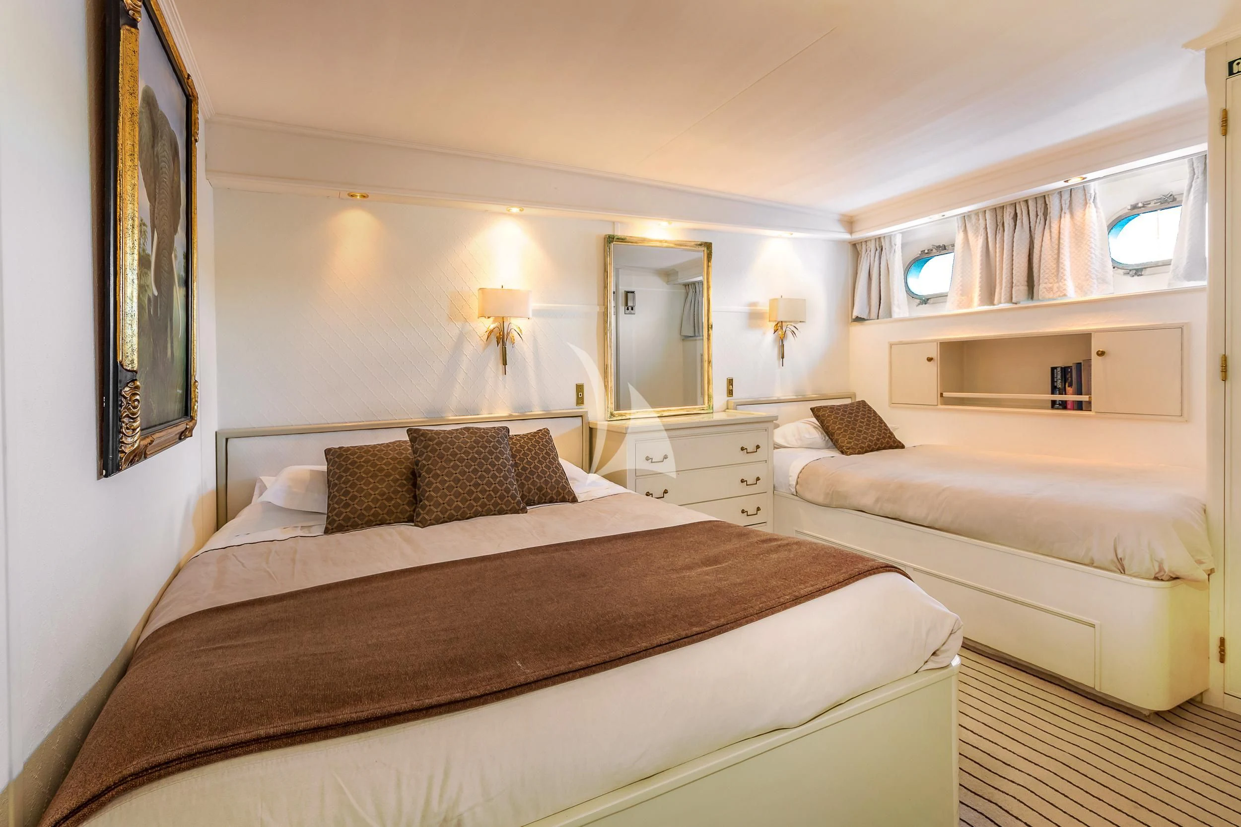 a bedroom with two beds aboard SECRET LIFE Yacht for Sale