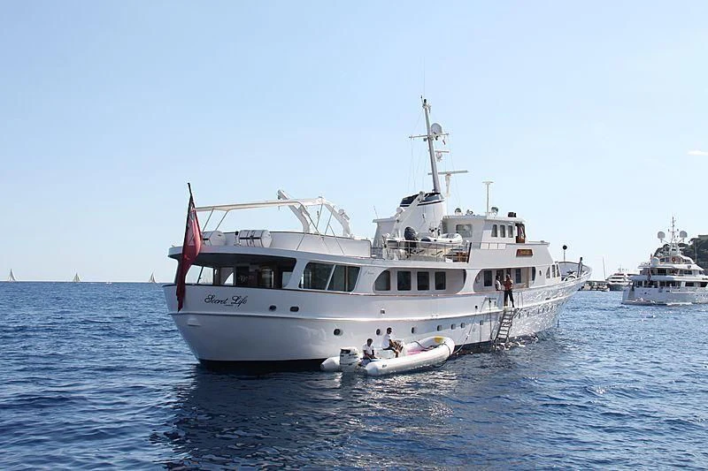 a large white boat in the water aboard SECRET LIFE Yacht for Sale