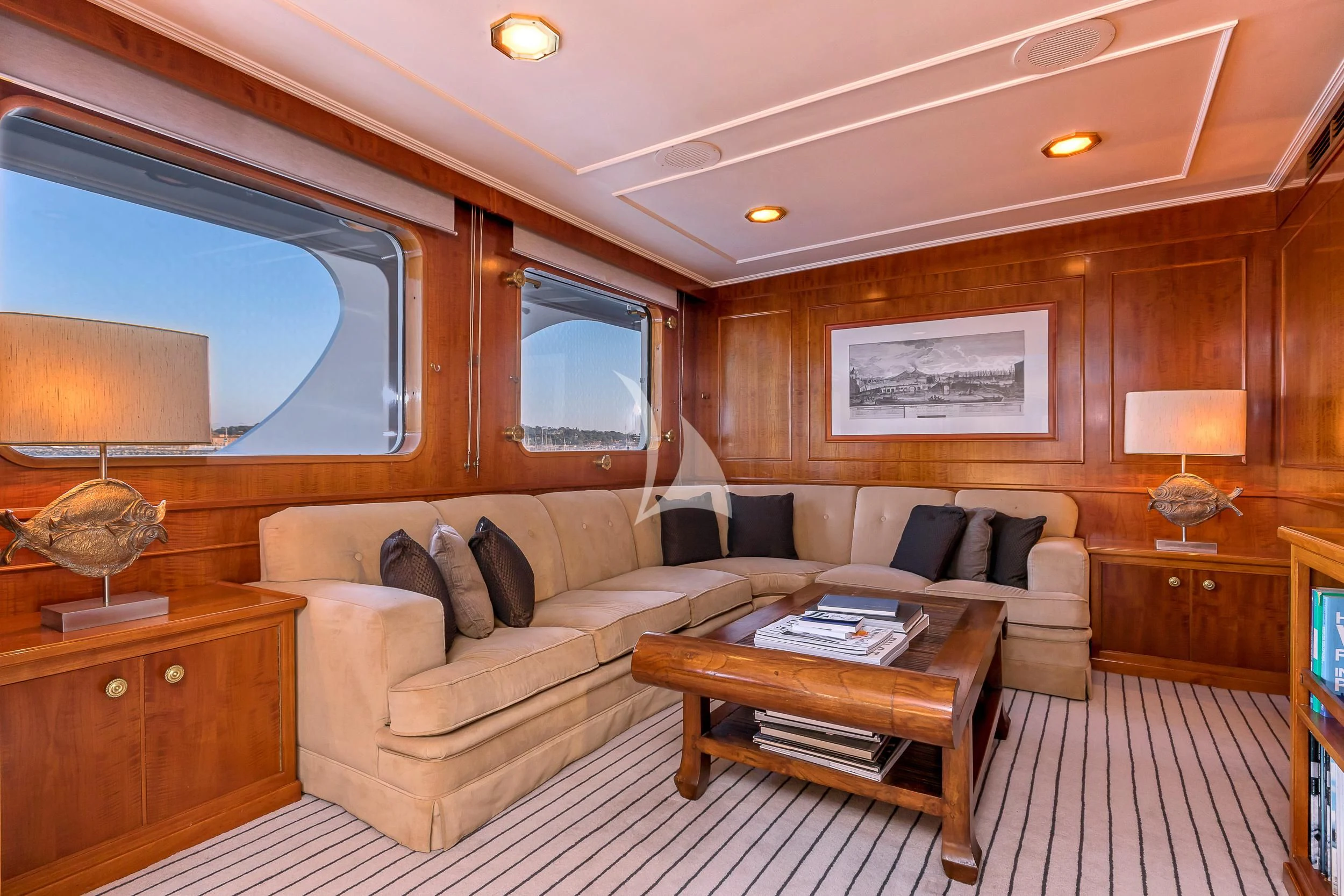 a living room with a couch and a coffee table aboard SECRET LIFE Yacht for Sale