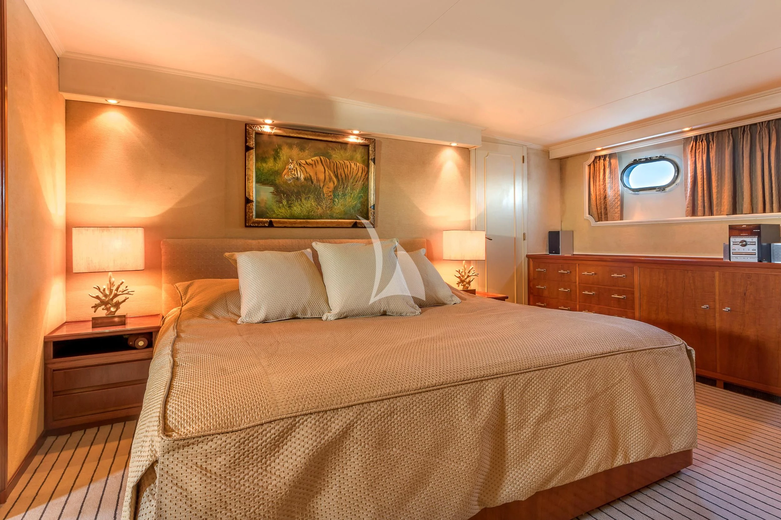 a large bed with white sheets aboard SECRET LIFE Yacht for Sale