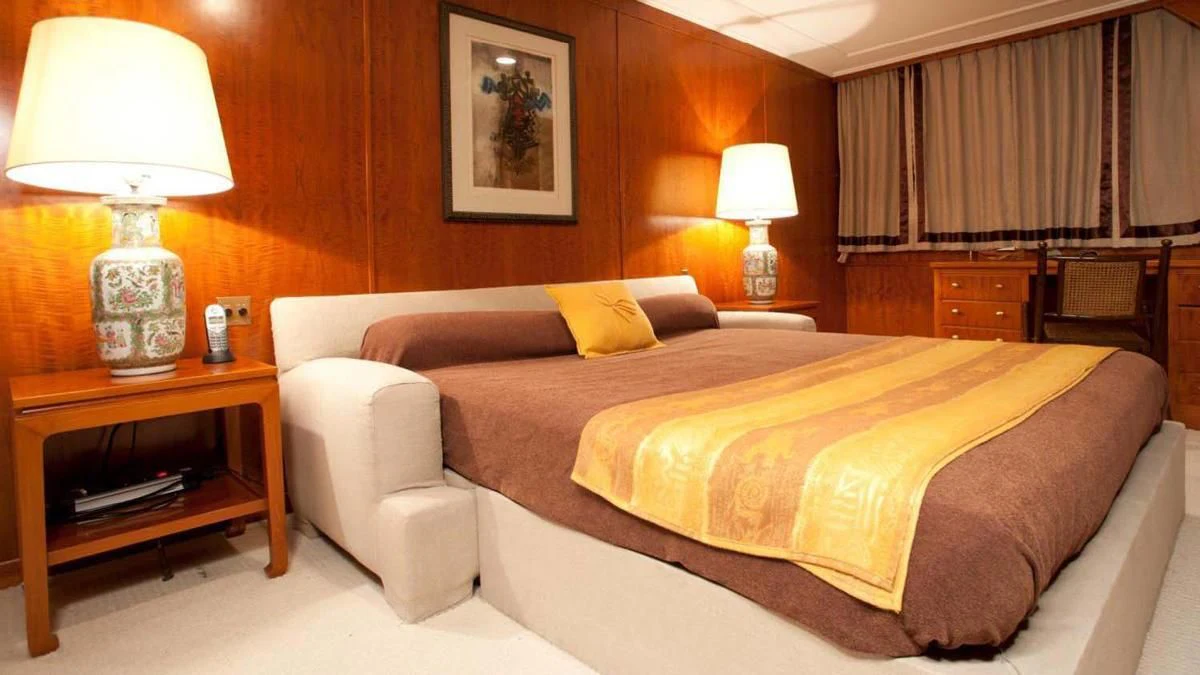 a bed in a room aboard SECRET LIFE Yacht for Sale