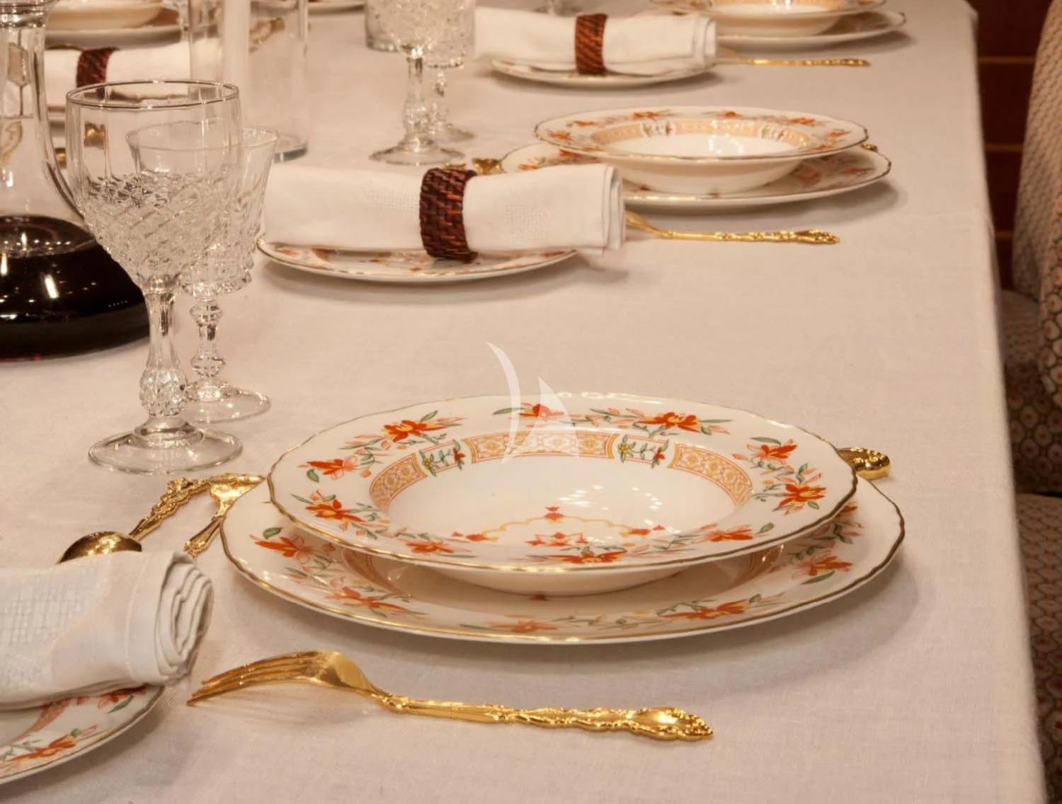 a table with plates and glasses aboard SECRET LIFE Yacht for Sale