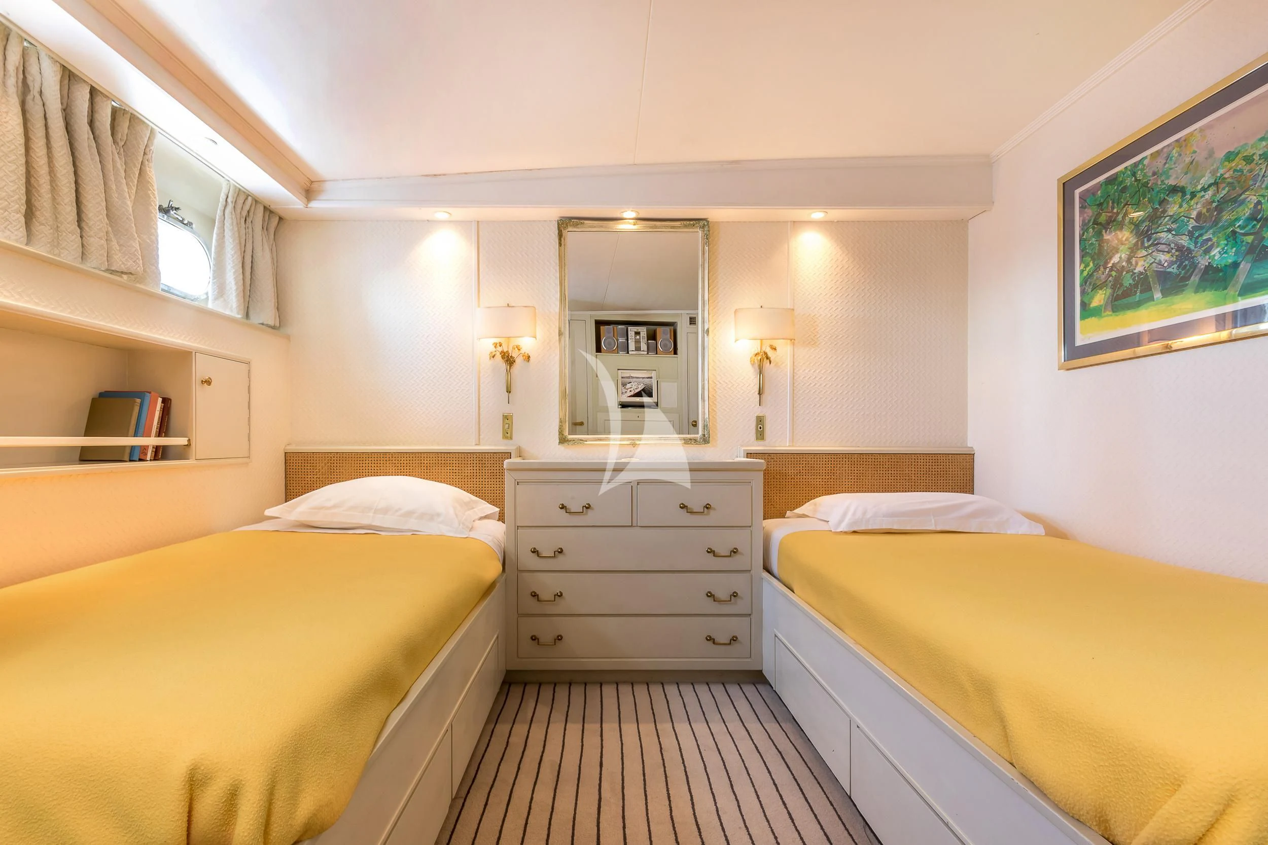 a room with a couple of beds aboard SECRET LIFE Yacht for Sale