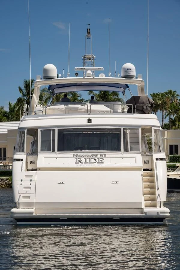 a white boat in the water aboard TOMORROW WE RIDE Yacht for Sale