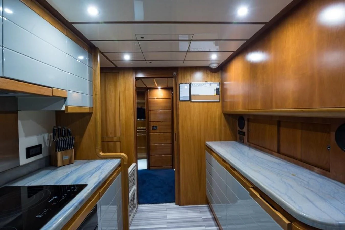 a room with a bed and a desk aboard TOMORROW WE RIDE Yacht for Sale