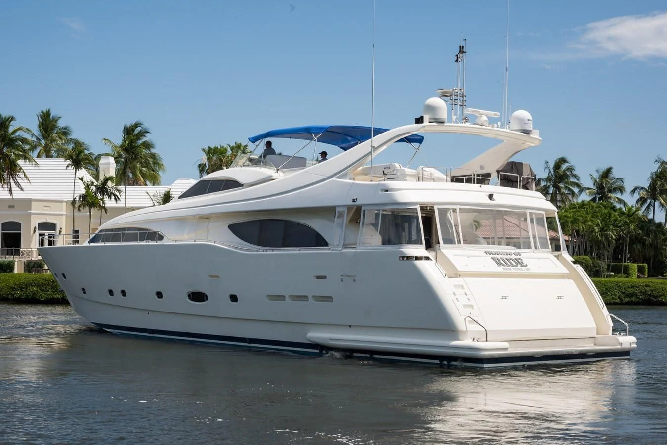 a white boat on water aboard TOMORROW WE RIDE Yacht for Sale
