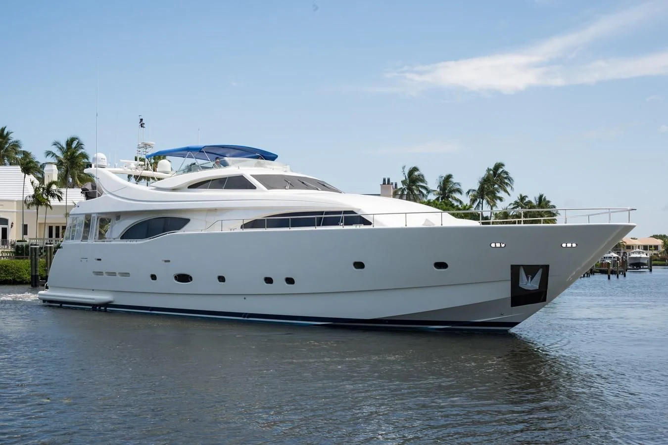 a white yacht on the water aboard TOMORROW WE RIDE Yacht for Sale