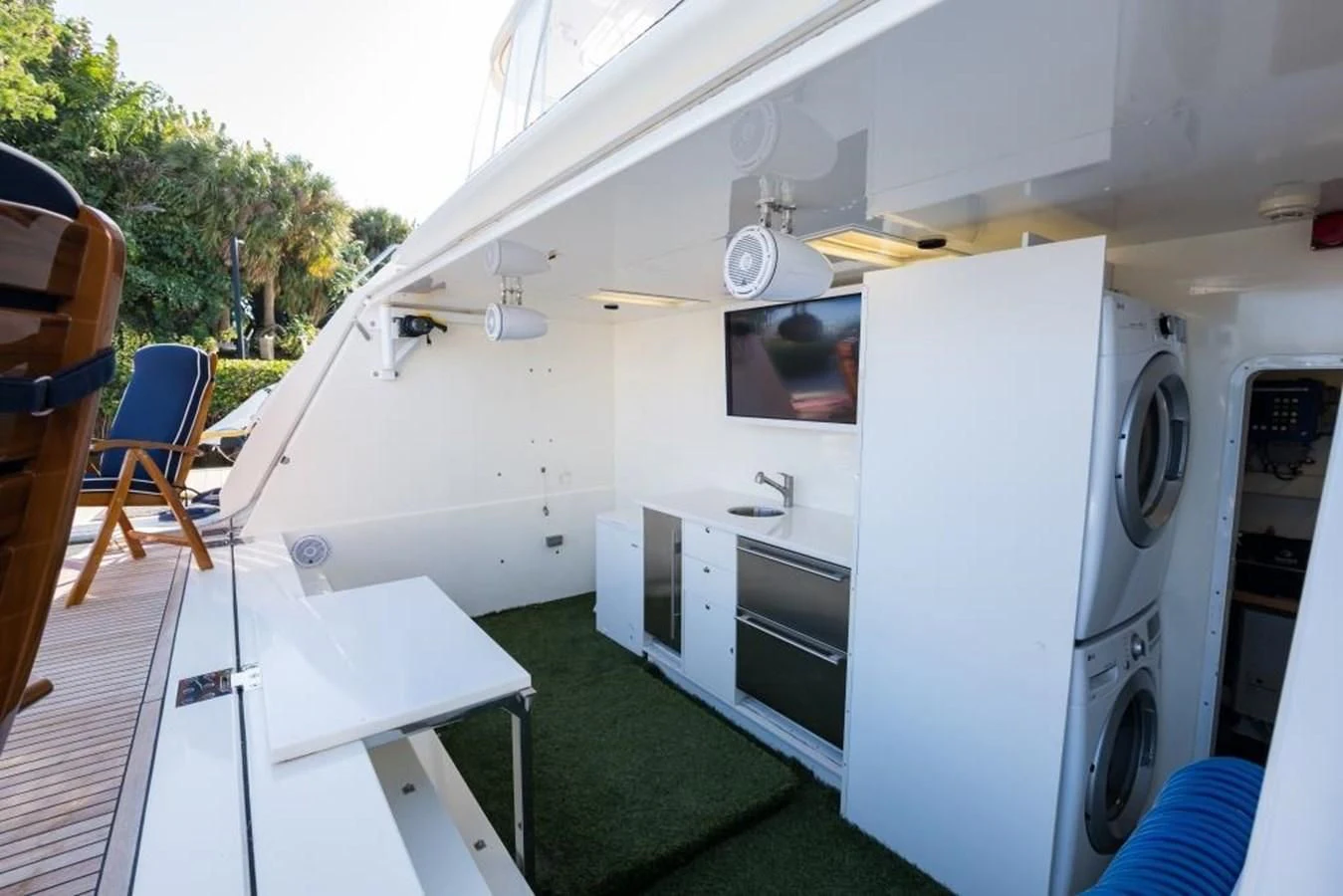 a white trailer with a green lawn aboard TOMORROW WE RIDE Yacht for Sale