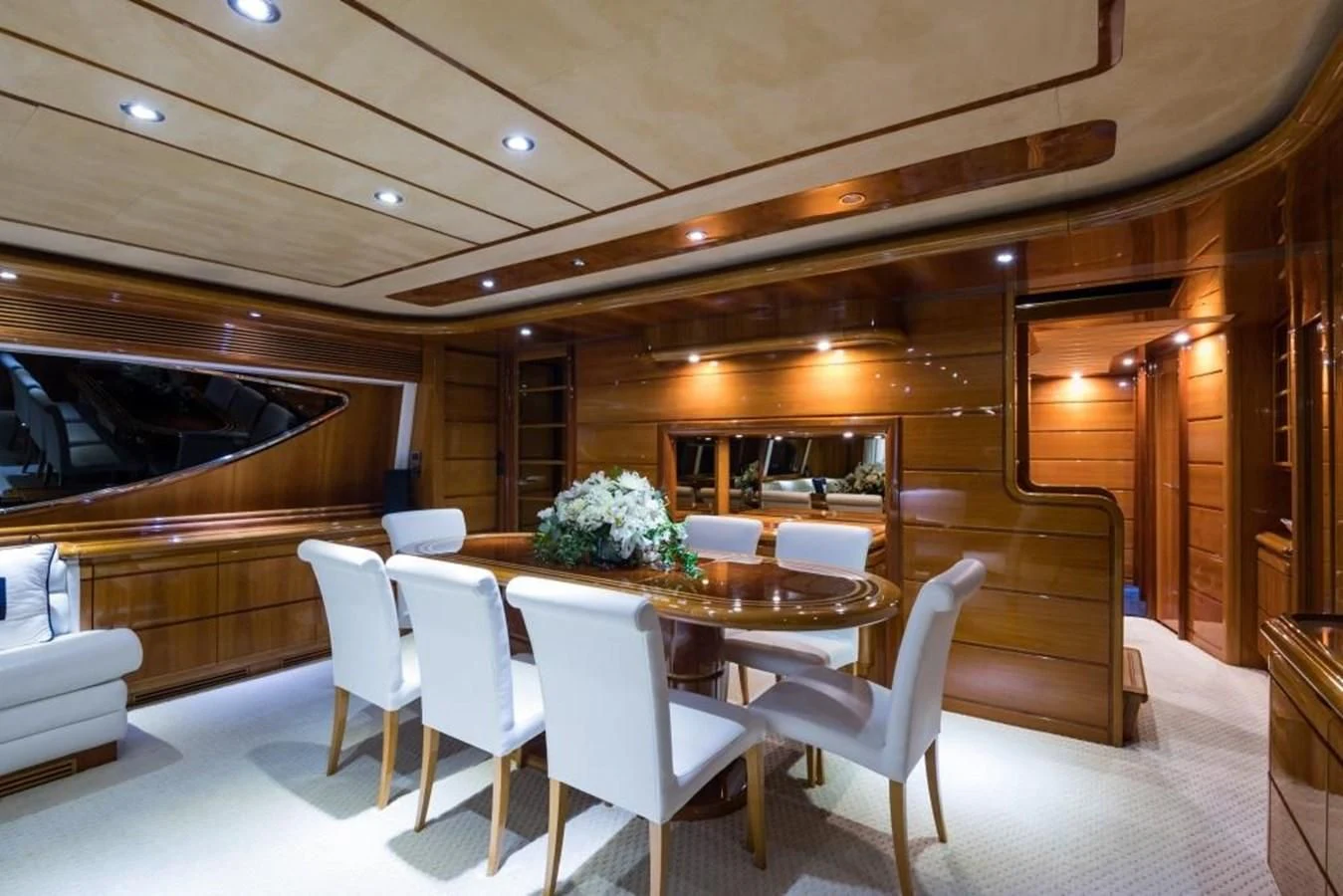 a room with a table and chairs aboard TOMORROW WE RIDE Yacht for Sale