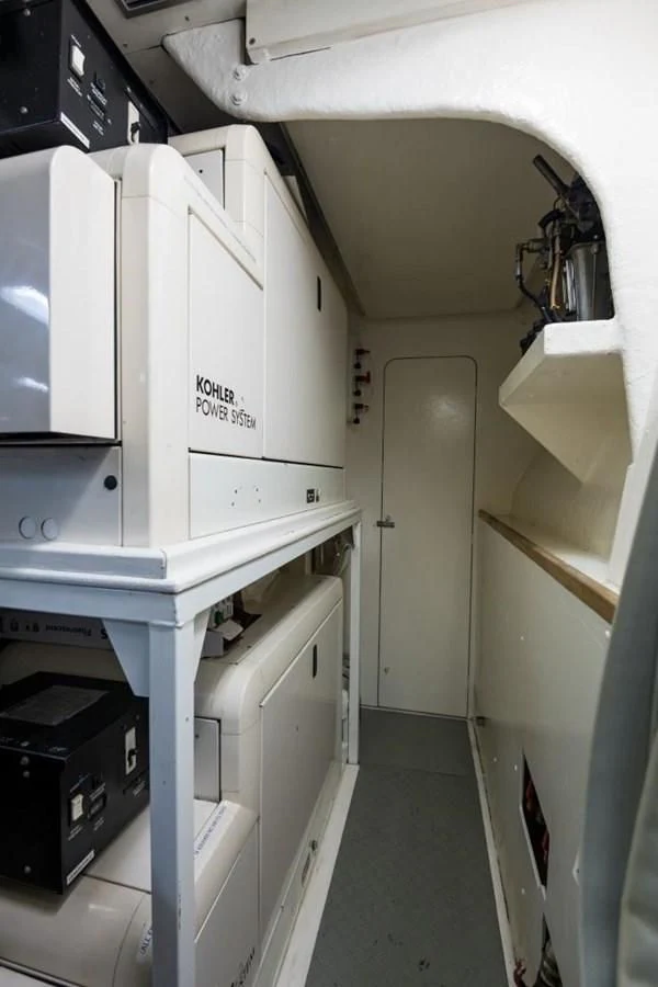 a room with several machines aboard TOMORROW WE RIDE Yacht for Sale