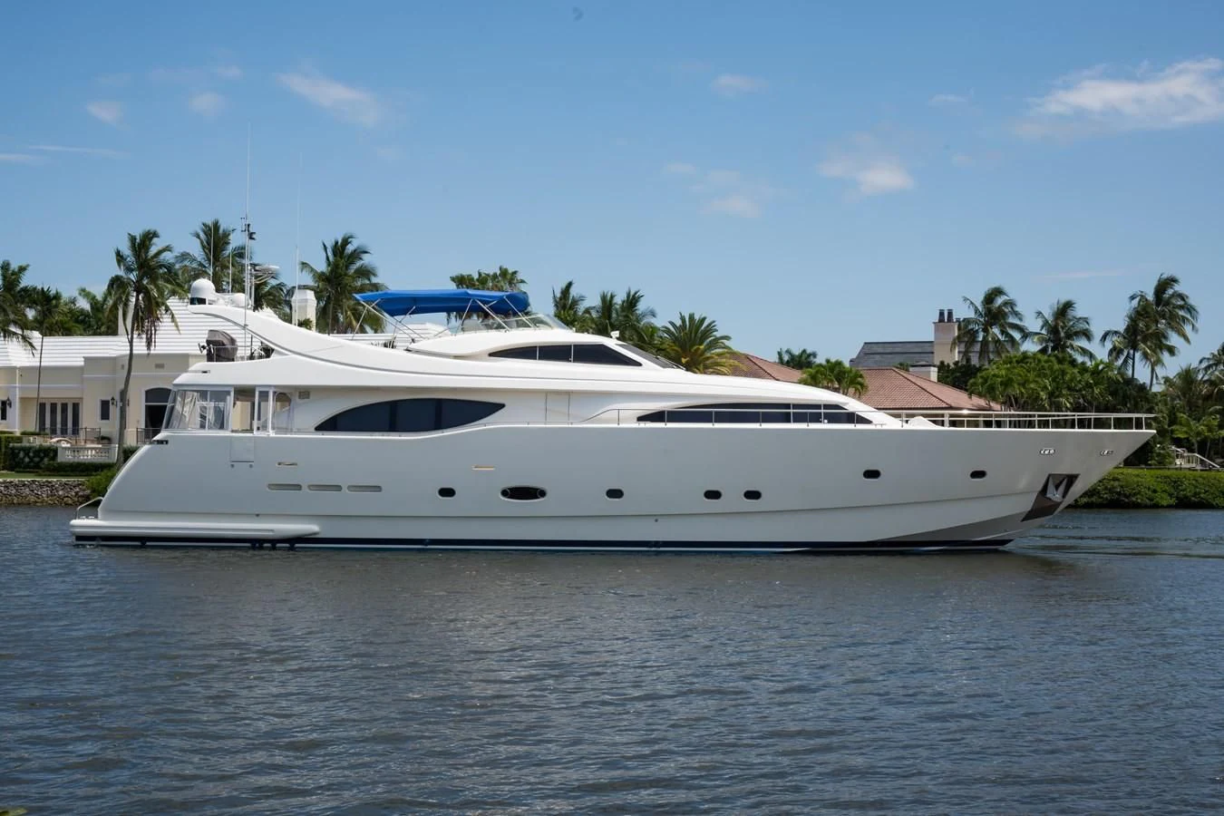 a white yacht on the water aboard TOMORROW WE RIDE Yacht for Sale