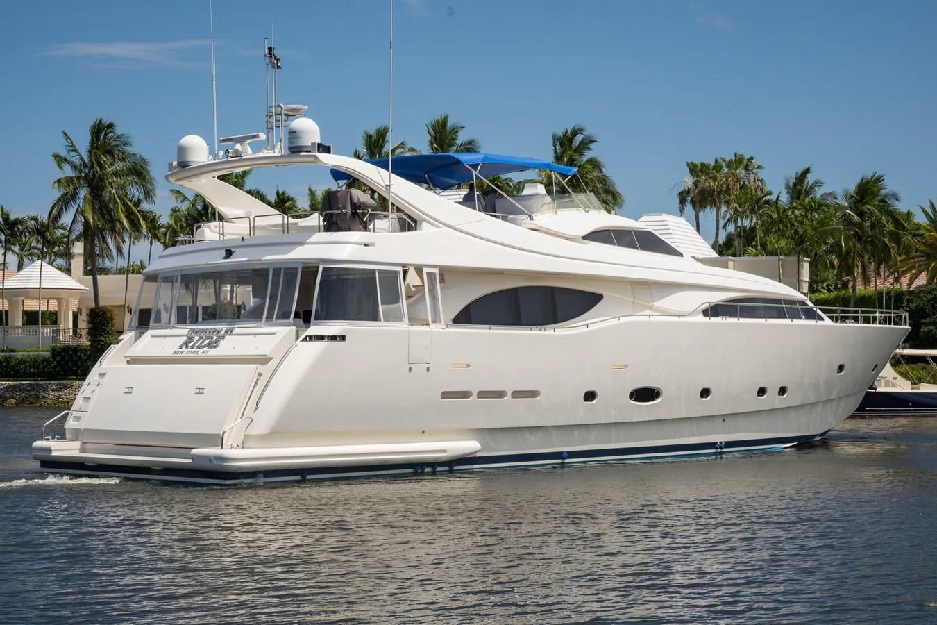 a white yacht on the water aboard TOMORROW WE RIDE Yacht for Sale