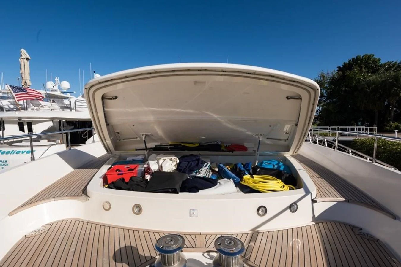 a large white tent with a group of kayaks on it aboard TOMORROW WE RIDE Yacht for Sale